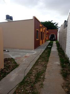 AMPLIO DUPLEX A ESTRENAR, 3 AMBIENTES, ENTRADA DE AUTO, PATIO Y PARRILLA. SE ENTREGA CON TERMOTANQUE, BAJOMESADA Y SANITARIOS. ACEPTA ANTICIPO Y CUOTAS!!! - imagen1